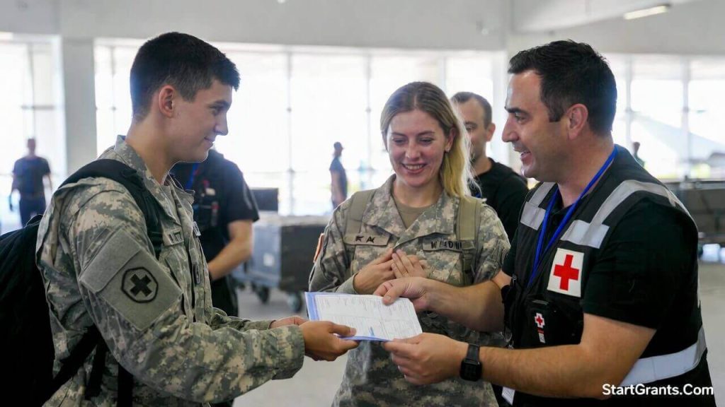 An American Red Cross caseworker assisting a distressed military family member with emergency travel arrangements and financial assistance for a funeral.