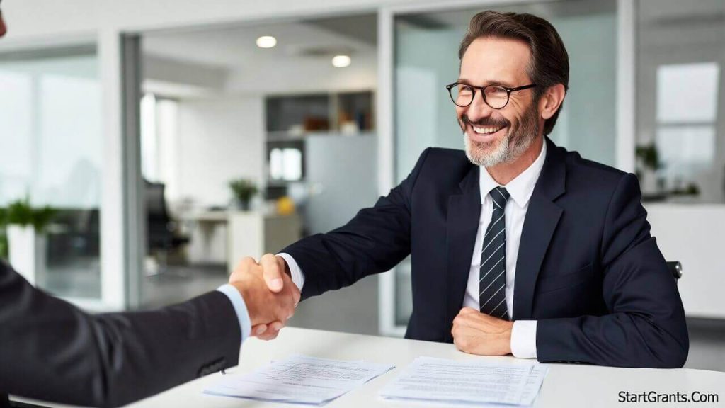A New York real estate attorney shaking hands with a client after a successful house closing.