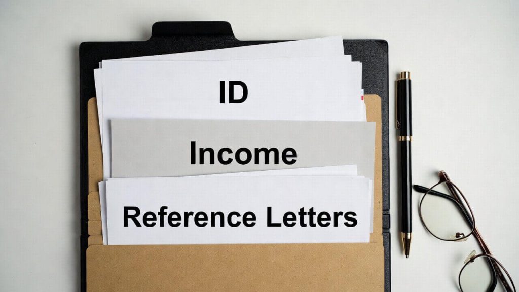 A folder containing documents required for rental assistance for single mothers applications.