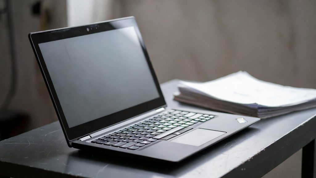 Typical refurbished Windows laptop or Chromebook provided by federal subsidy programs like PCs for People.