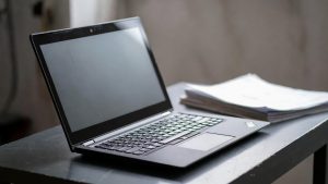 Typical refurbished Windows laptop or Chromebook provided by federal subsidy programs like PCs for People.