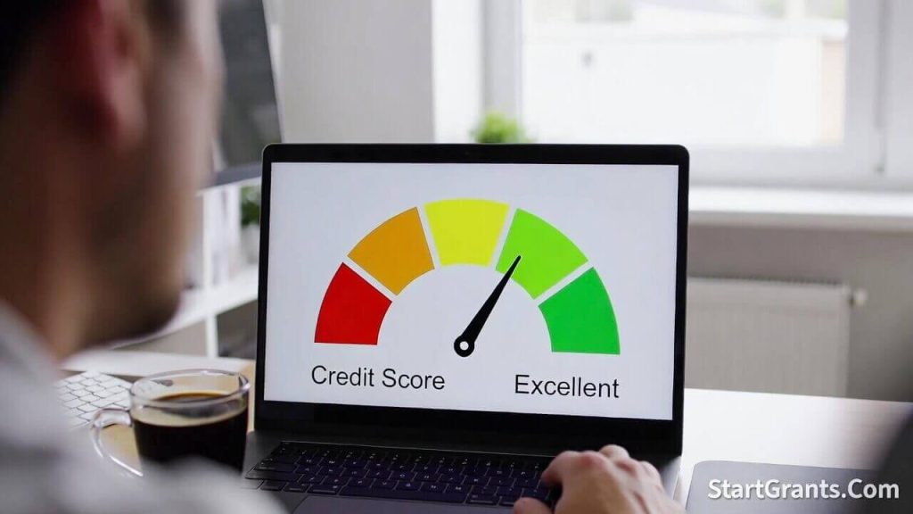 A person checking their credit score on a laptop to qualify for a housing grant.