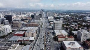 A family searching for information on low income housing in Los Angeles