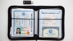 Storing important documents (ID, SSN, Birth Certificate) in a waterproof folder for housing applications.