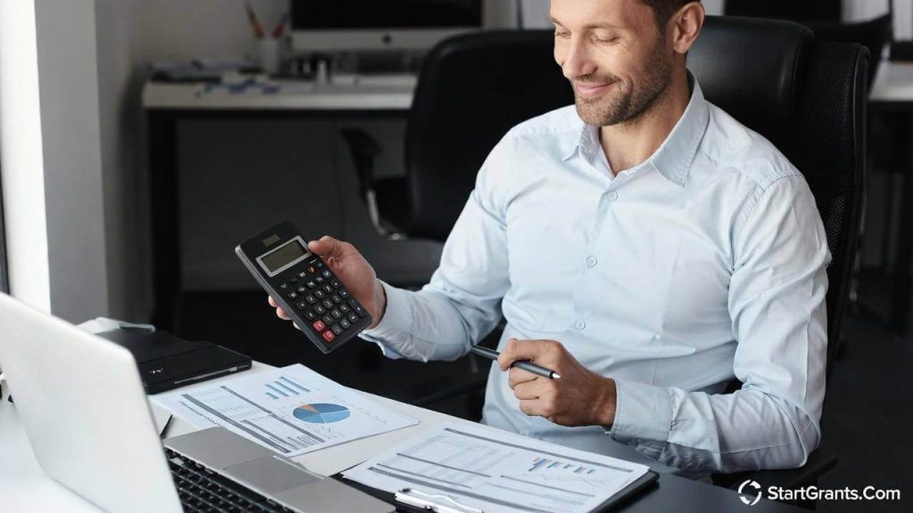 An adult student reviewing tax forms and financial aid documents on a laptop, representing the AOTC and Lifetime Learning Credit.