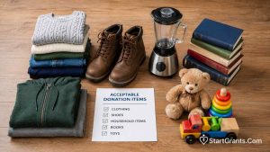 A neat pile of acceptable donation items including clothes, shoes, books, and small appliances.