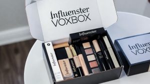 Influenster VoxBox open showing free full-sized luxury makeup products for product testing.