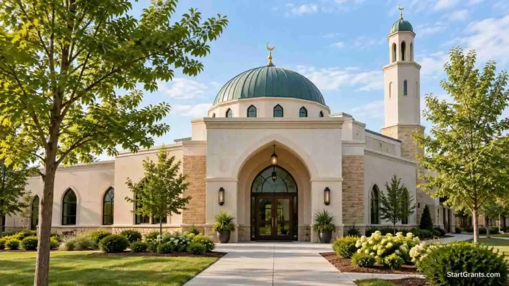 Mosque exterior with a dome, arched entrance, and landscaped walkway.